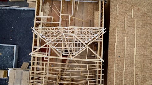 Top View of Wooden Houses under Construction 