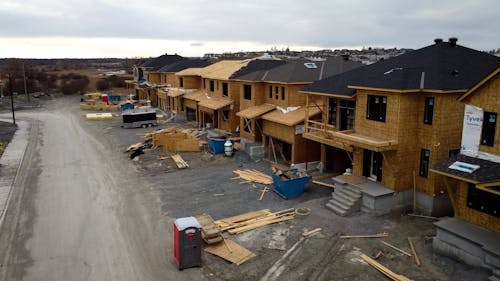 Drone Video of Wooden Houses under Construction