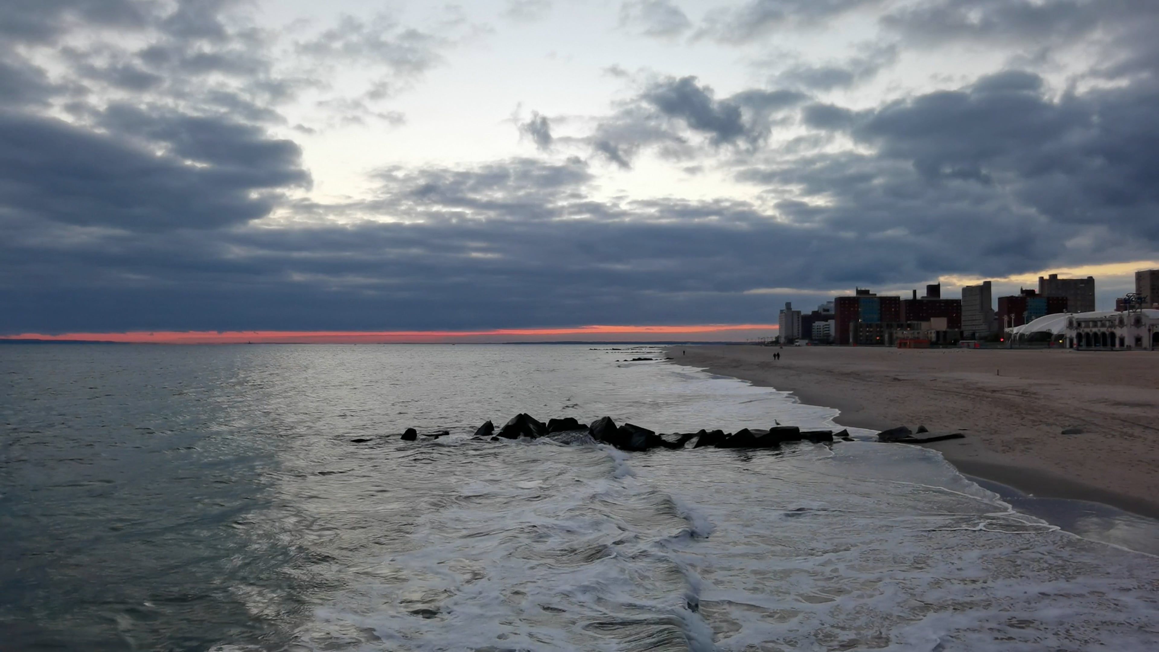 a cloudy sunset at the beach 11882366