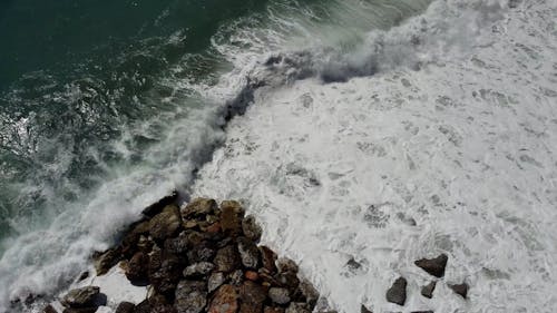 Sea Waves Crashing on a Rocky Shore 