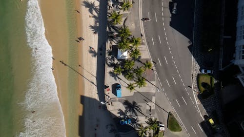 Drone Footage of Beach and Alley in Coastal City