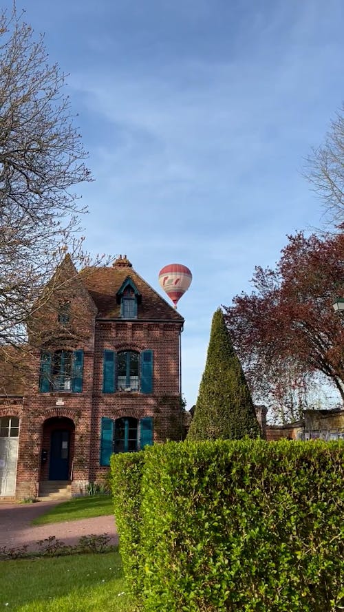 Balloon behind Building in Village