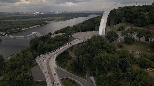 People Walking on the Bridge