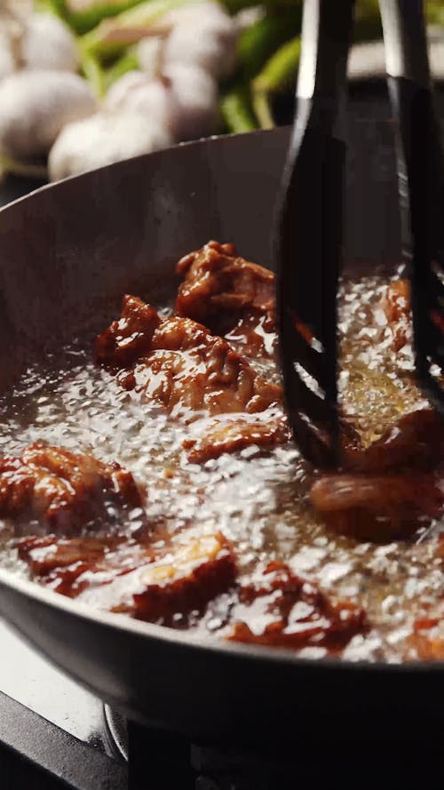 Frying Meat on Pan