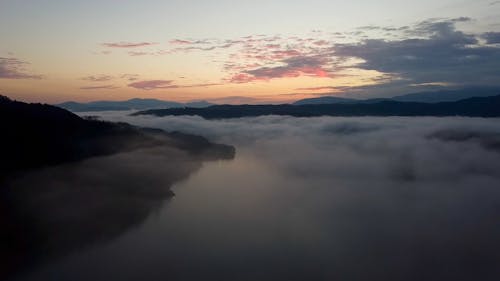 Drone Footage of a River on a Misty Morning