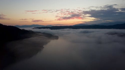 Drone Video of a River on a Misty Morning