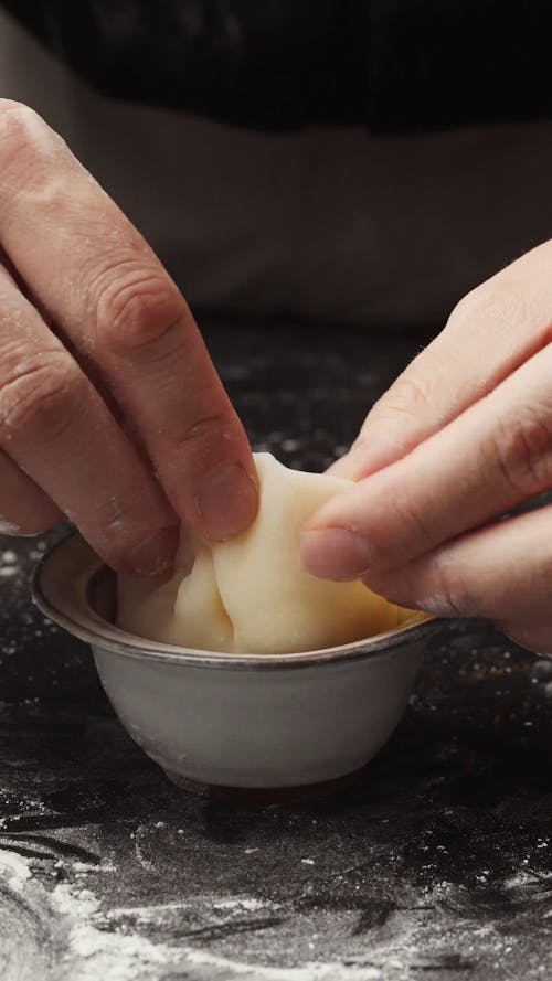 Sticking Dough Together with Hands