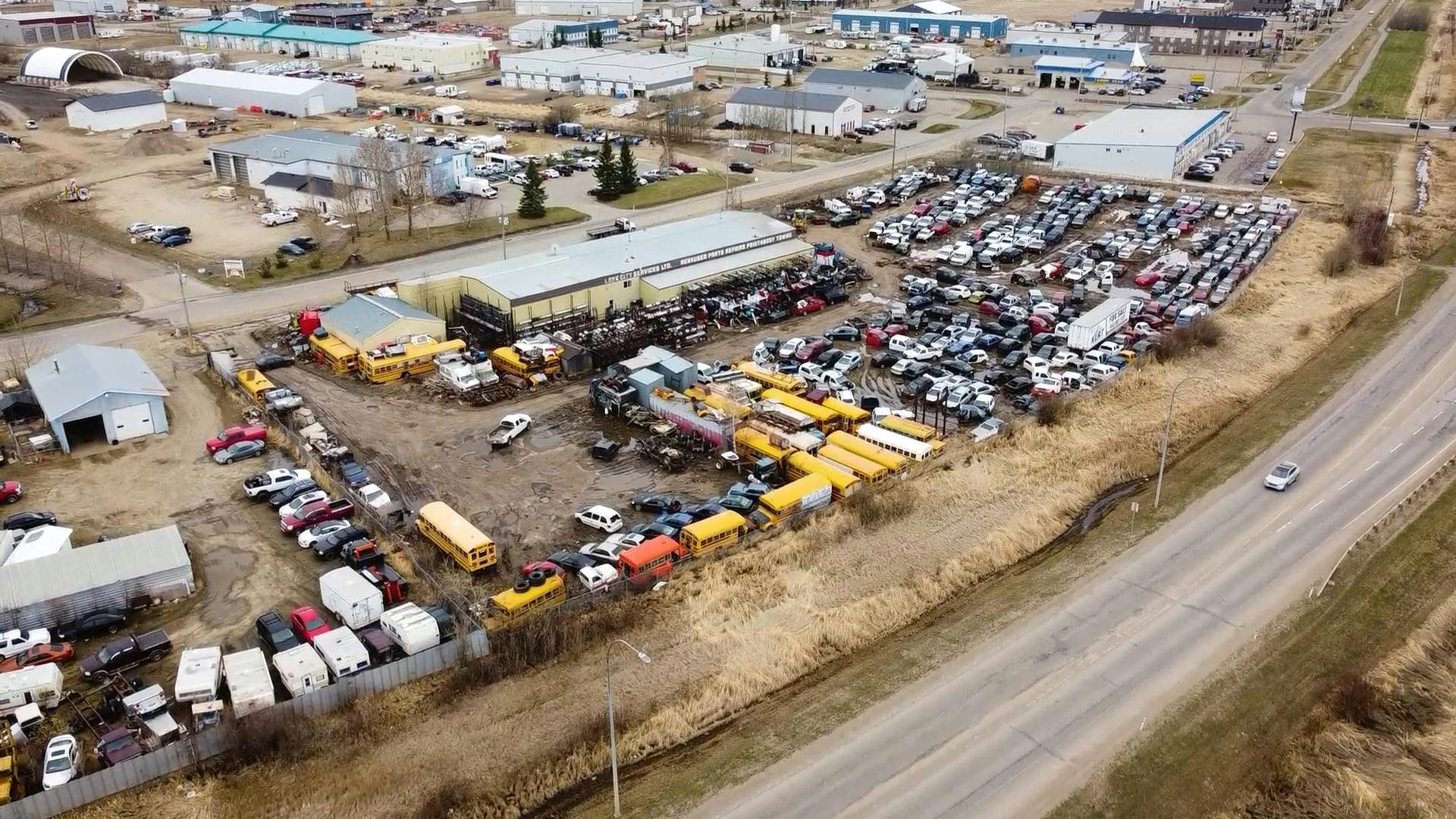 Scrapyard by Road in Edmonton Free Stock Video Footage, RoyaltyFree 4K