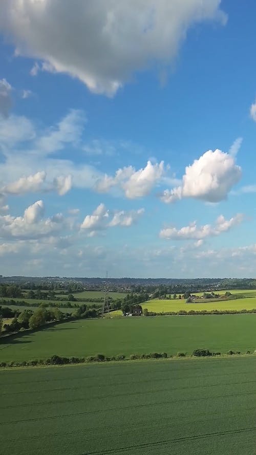 Clouds over Green Fields