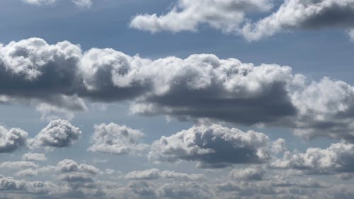 Fluffy White Clouds in the Sky 