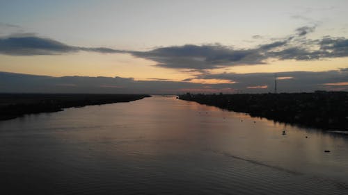 Clouds over River during Sunset