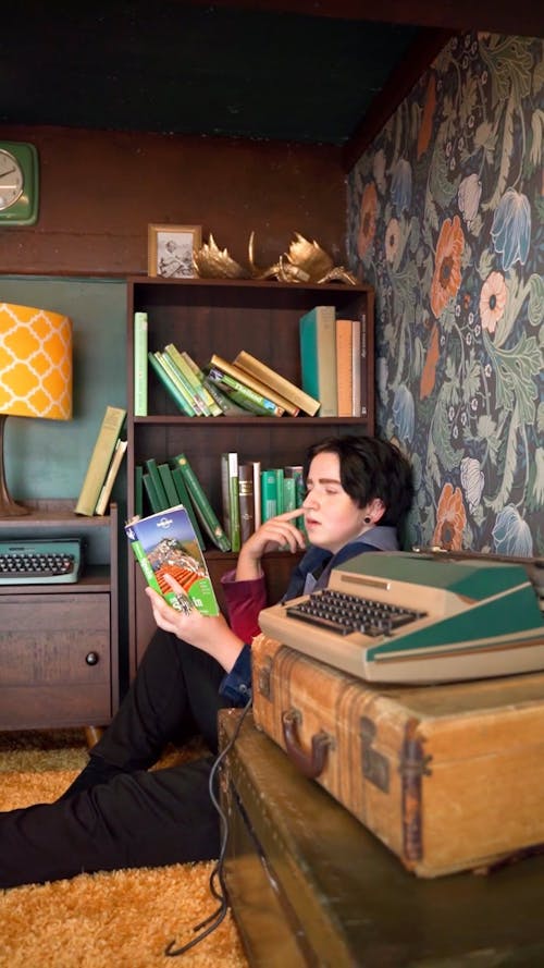 Woman Reading Book in Retro Room