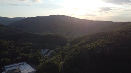 Drone Footage of a Mountain Landscape at Sunset 