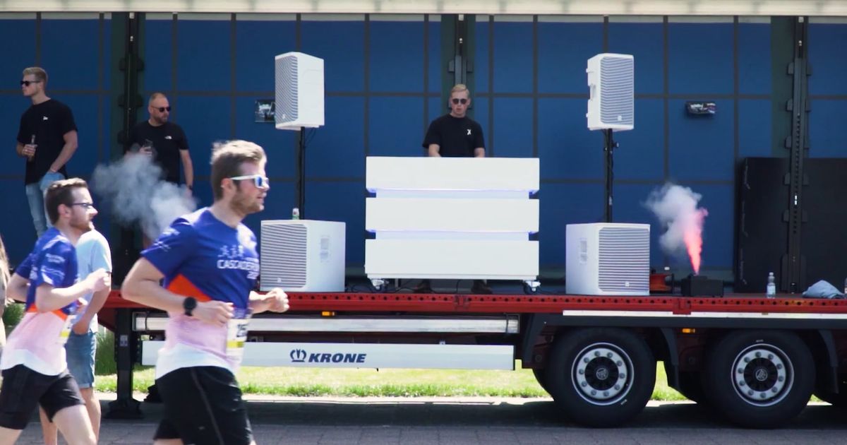 a dj playing music during a marathon 12510400