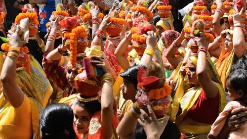 Crowd of Women Carrying Offerings on Heads During a Hindu Festival