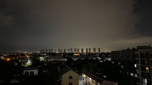 Storm Over a City at Night