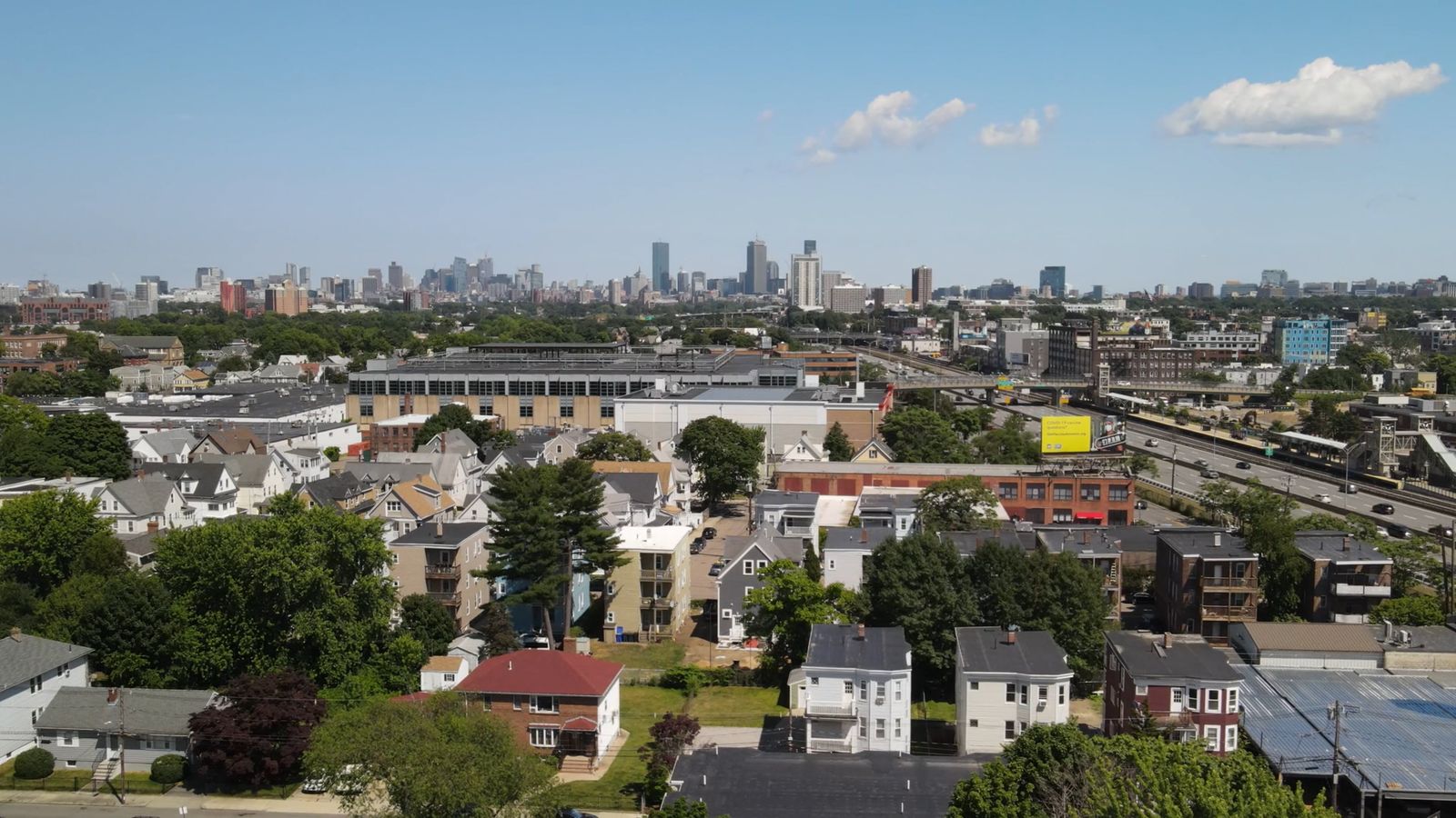 Drone Footage Above a City Street and Houses Free Stock Video Footage ...