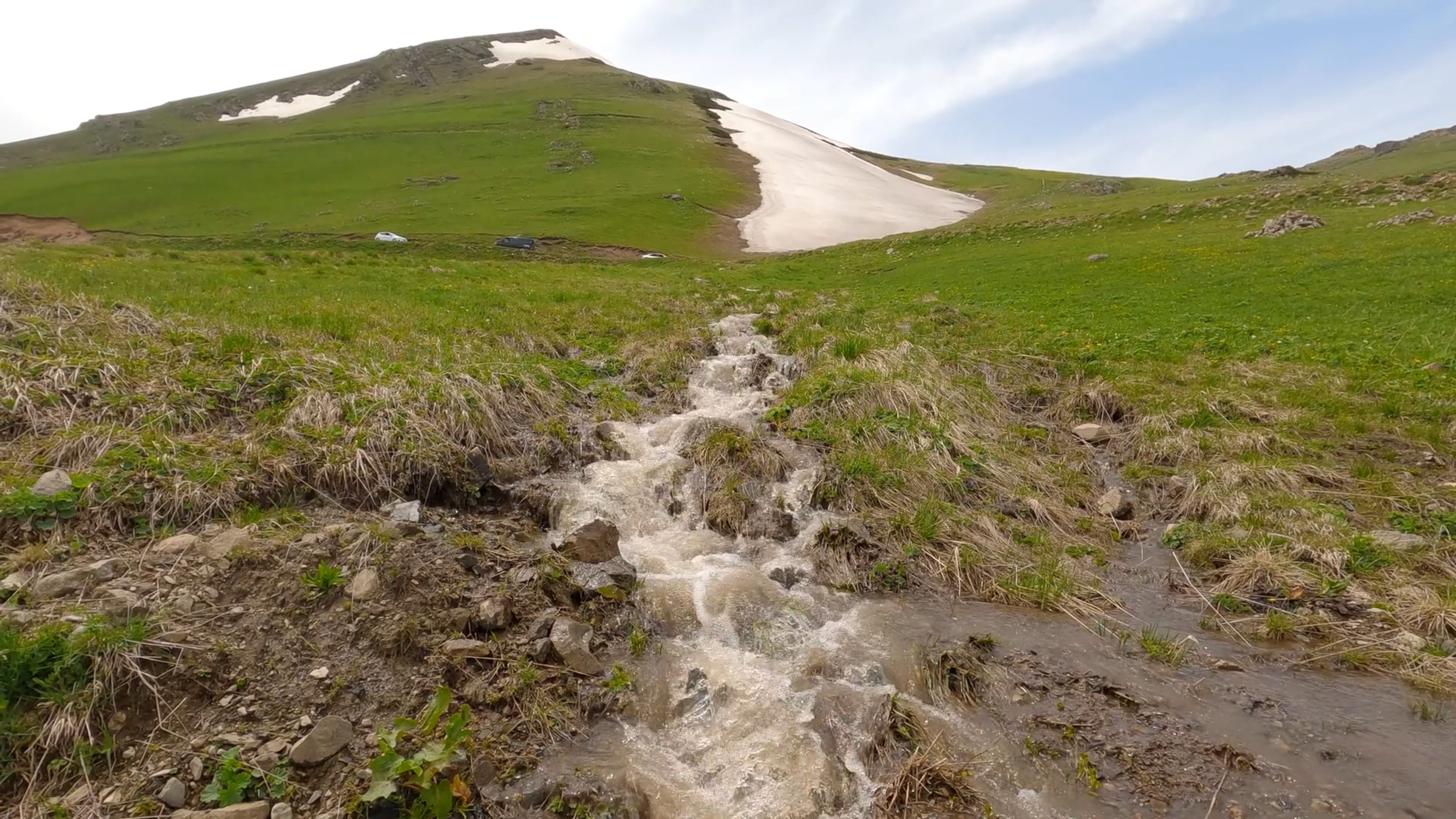 A Stream Flowing down a Mountain Slope Free Stock Video Footage ...