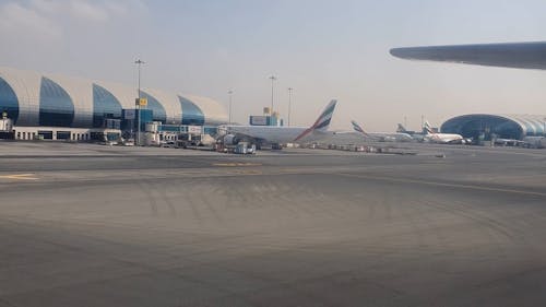 Window View of a Plane Taxiing at Dubai Airport 