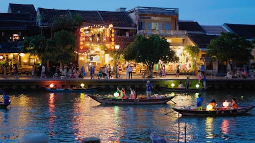 Boats on a River with Lanterns During an Asian Festival