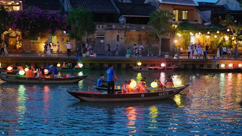 Boats on a River with Lanterns During an Asian Festival