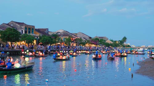 Boats on a River with Lanterns During an Asian Festival