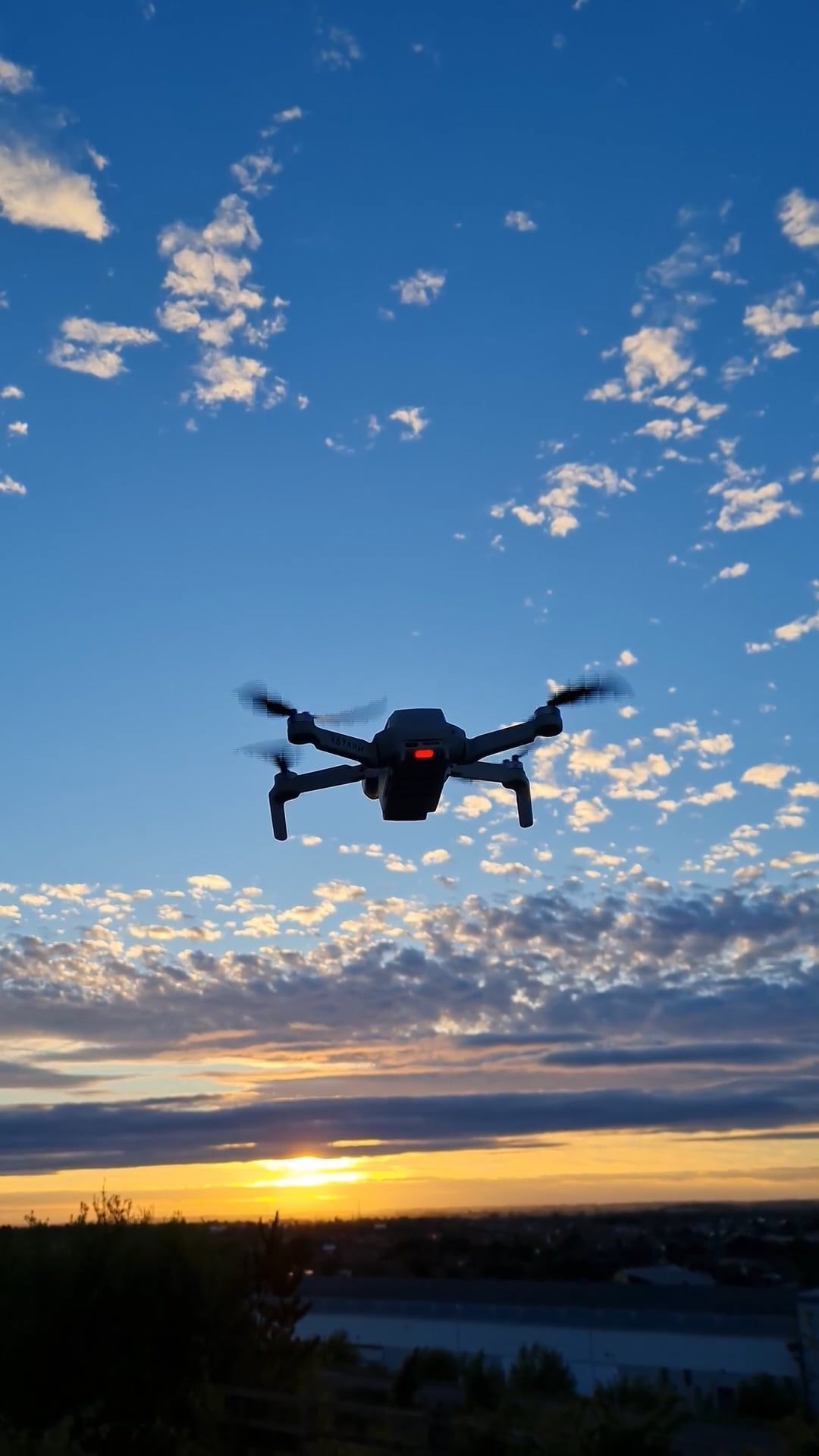 drone flying against a moody sky at sunset 12738673