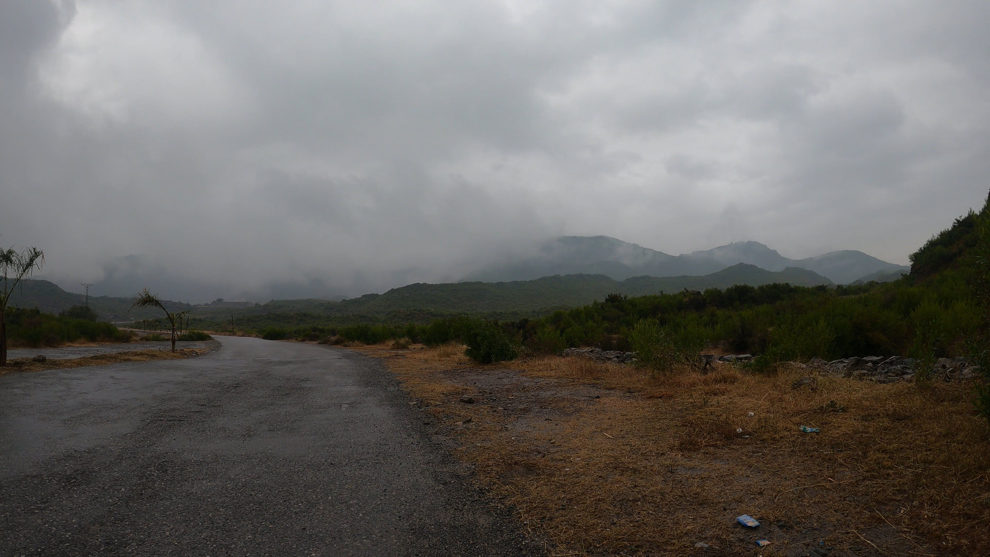 Time Lapse of Clouds Moving over a Road in a Mountain Landscape Free ...