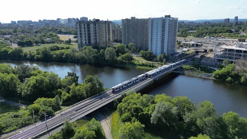 Drone Video of a Train Crossing a Bridge 