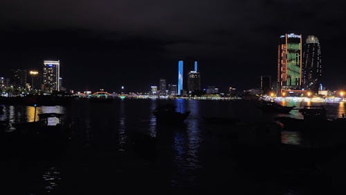 Time Lapse of a City across Water during Night