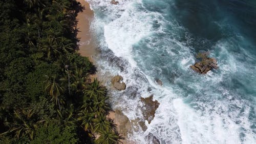 Drone Shot of Waves Splashing on a Tropical Beach, Costa Rica