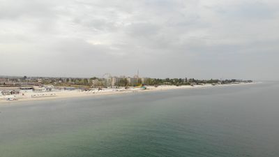 Aerial View of a Coastal City with Sandy Beaches Free Stock Video ...