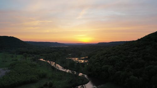 Sunset over River and Forest