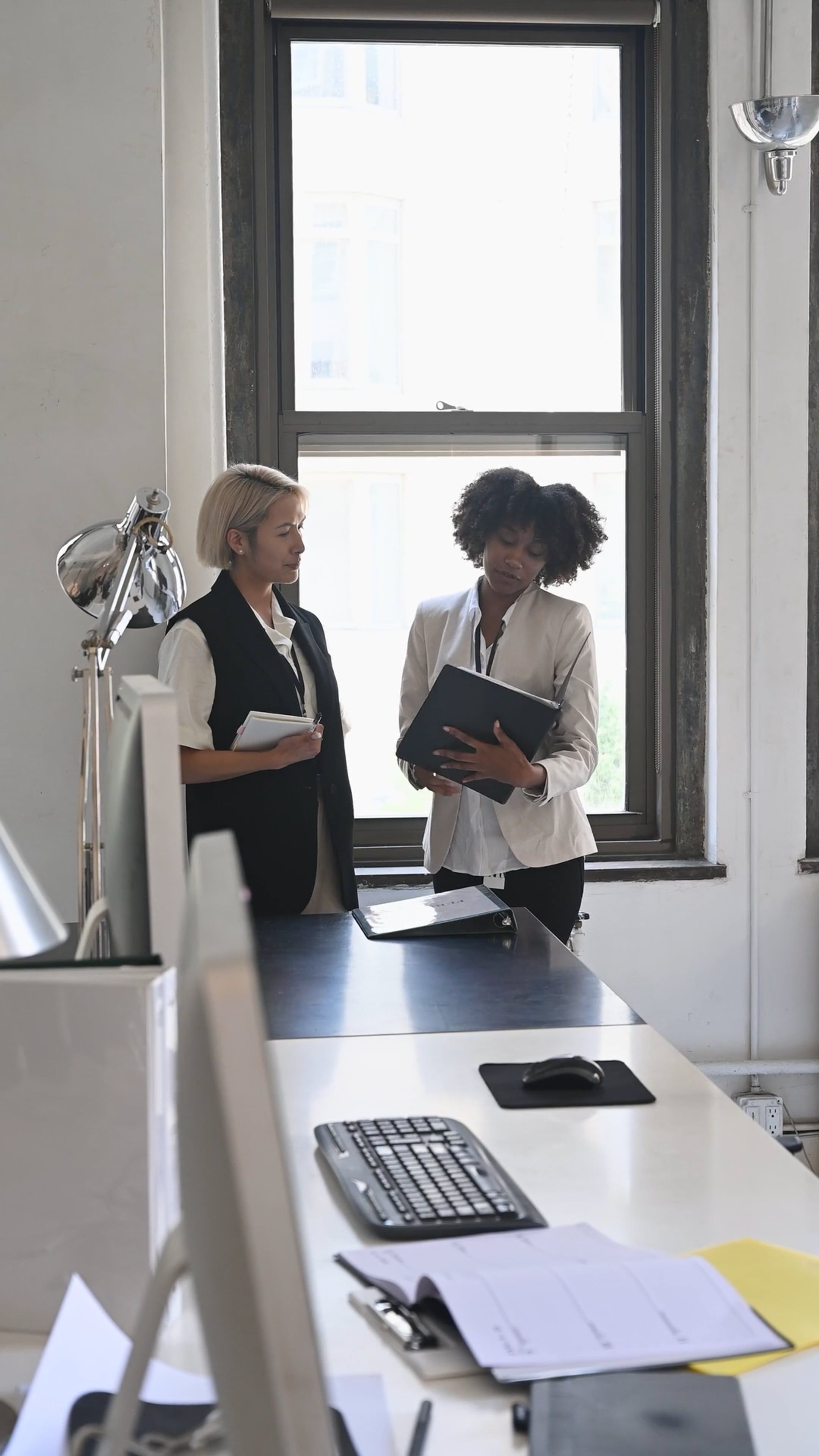 women talking at work 12893608