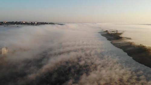 Drone View of Thick Fog over the River 