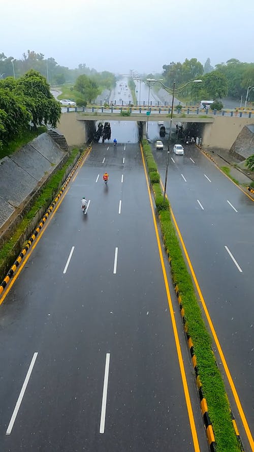 High Angle View of Vehicles on a Highway on a Rainy Day 