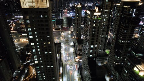 Illuminated City at Night Drone Footage