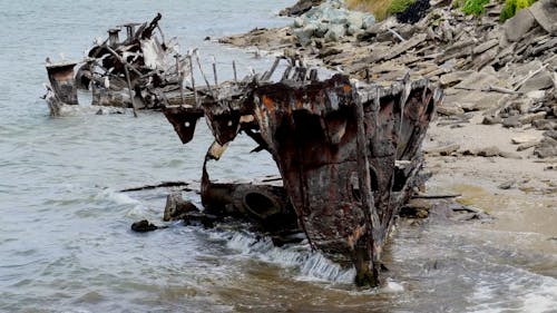 Waves Crashing on Shipwreck in Slow Motion