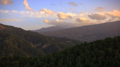 Hyperlapse of Moving Clouds over a Mountain Range 