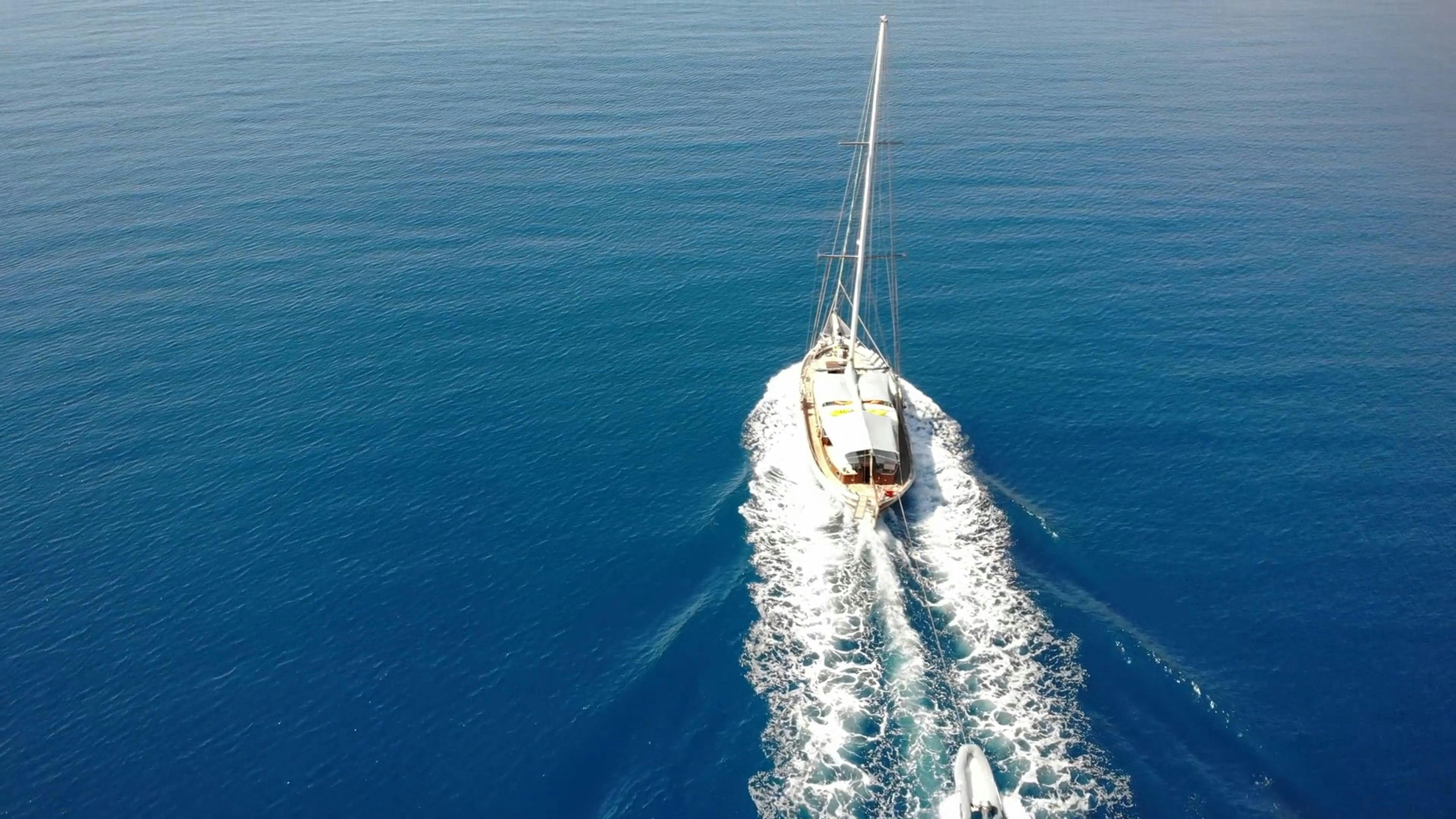 Sailboat Towing Motorboat Free Stock Video Footage, RoyaltyFree 4K