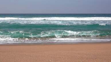 waves over beach