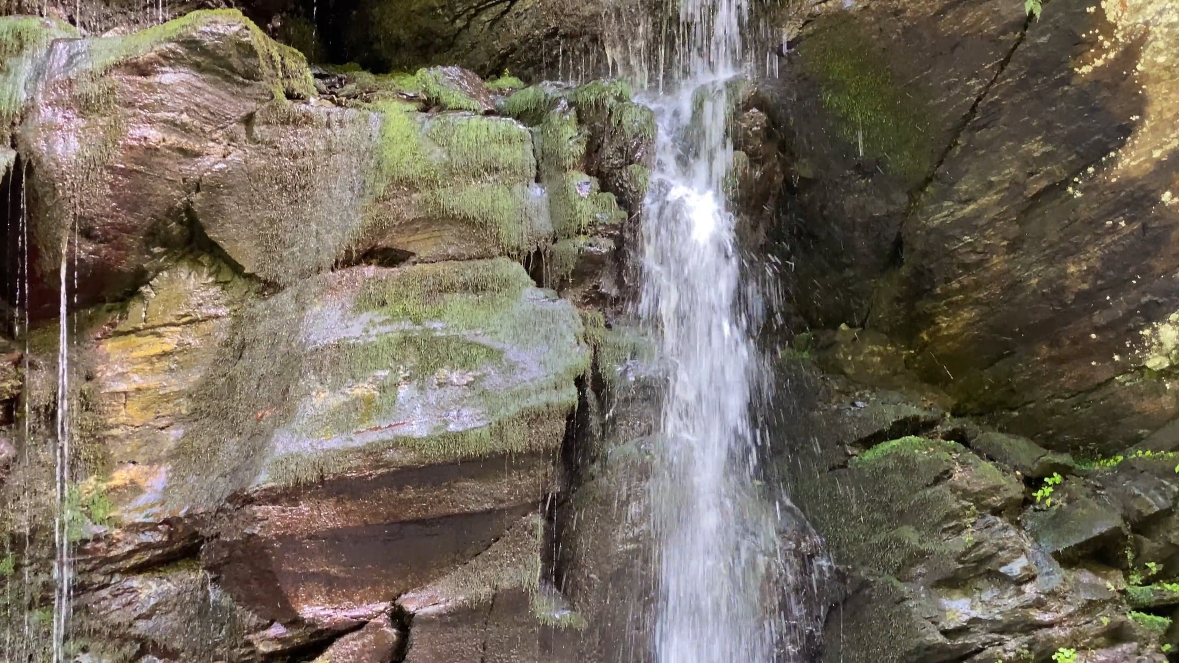 Close-up View of Waterfall Against Rock Formation Free Stock Video ...