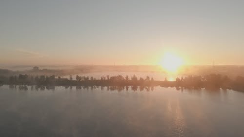Drone Footage of a Lake on a Foggy Morning 