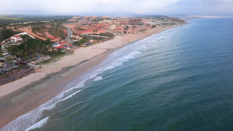Drone View of a Coastal City with Sandy Beaches Free Stock Video ...