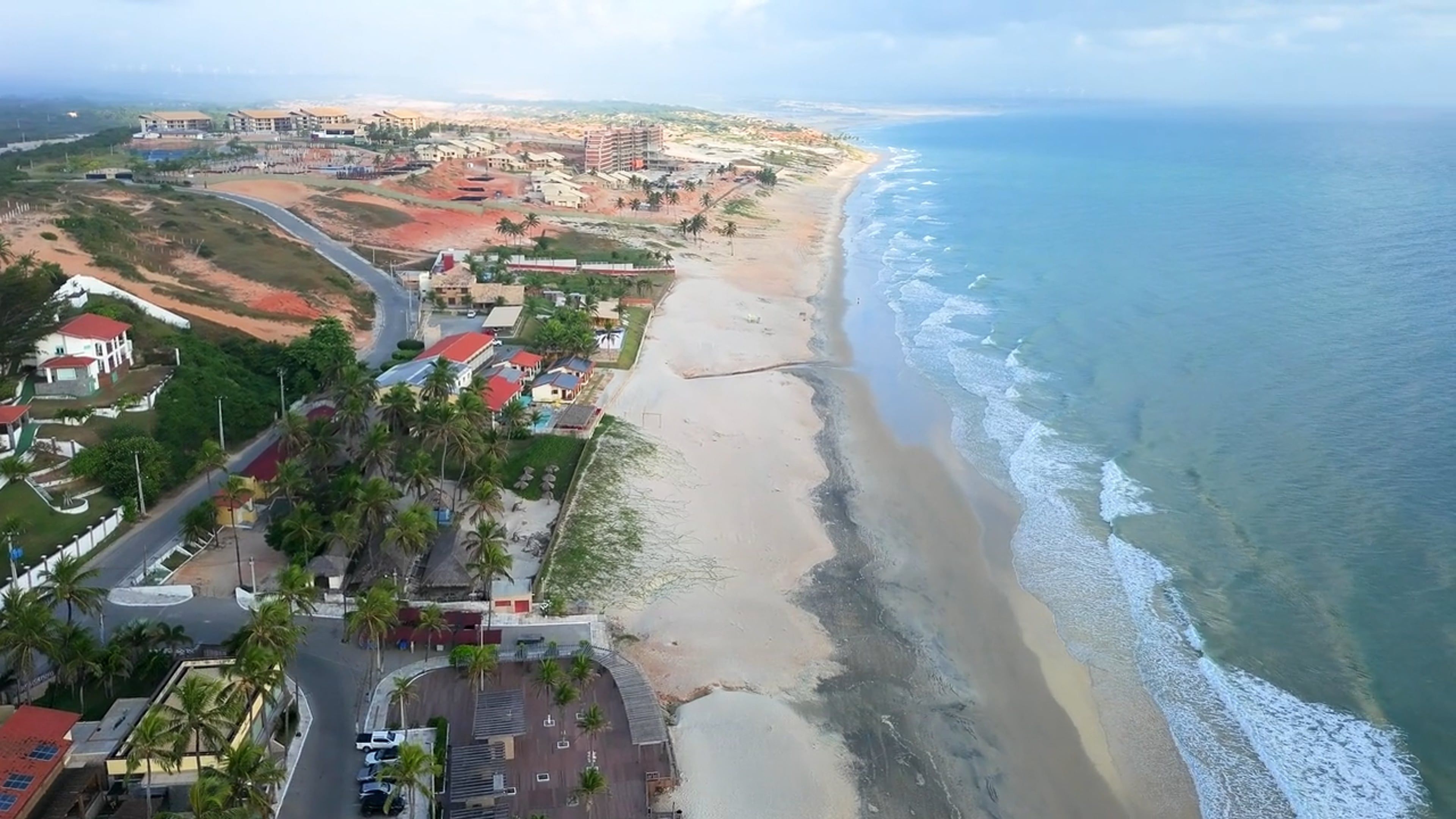 Drone View of a Coastal City with Sandy Beaches Free Stock Video ...