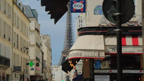 Partial View of the Eiffel Tower from a Parisian Street 