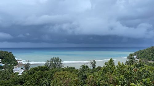 Time Lapse of Storm Clouds over a Tropical Island Beach 