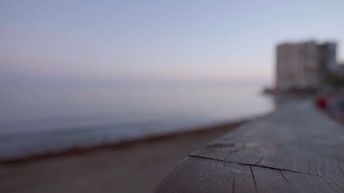 View of a Coastal City Beach at Sunset 