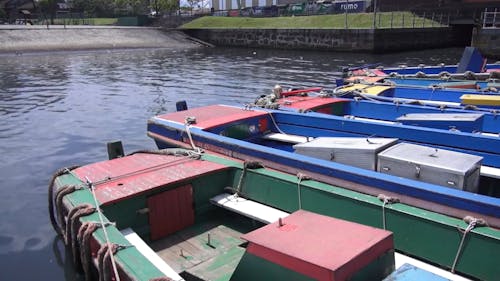 Boats Moored in City