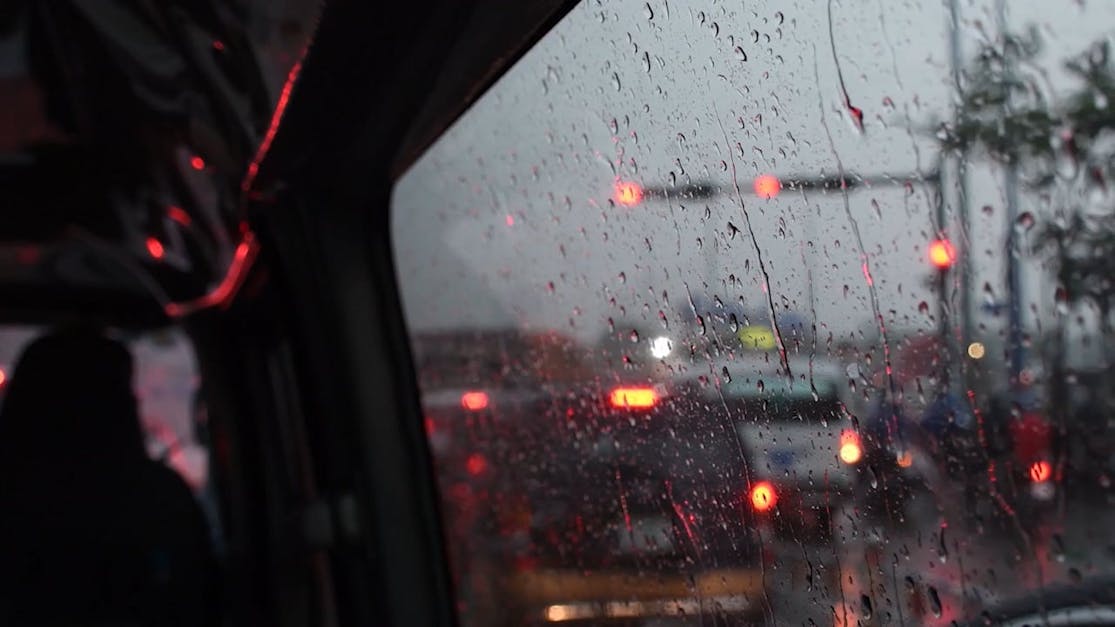 Car Window Rain Stock Footage ~ Royalty Free Stock Videos